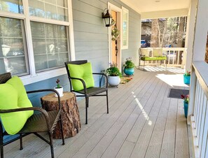 Sit and stay a while on the covered front deck.
