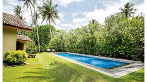 private outdoor pool for chalet guests only. Boundary wall around