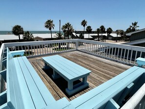 Soak in the views of the coast from the relaxing roof top deck!