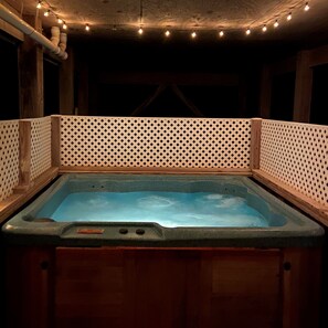 The hot tub after dark is the perfect nighttime hangout 
