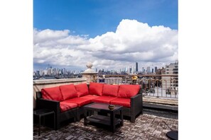 Main outdoor balcony with Manhattan skyline in all its glory
