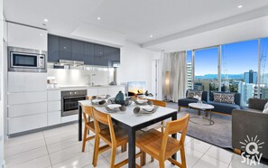 Sophisticated dining area is right next to the kitchen and the living area