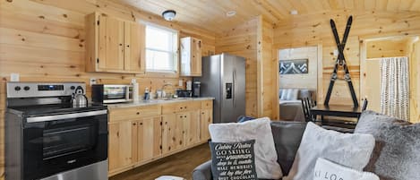 This cozy and comfortable 575 sq ft cabin has an open layout and 2 bedrooms.