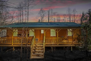 The cabin is nestled in a private wooded 0.9 acre lot.