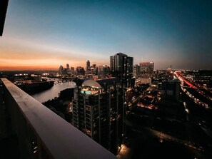 Enjoy the balcony with a glass of wine while watching the sunset over the city.