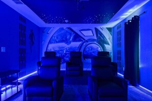 Step inside your own private escape to a galaxy far, far away! Experience the thrill of movie night in this theater room whose doors and windows shut out reality. Relax into these comfortable seats!