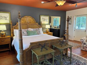 Comfortable king-sized bed with an abundance of pillows & crisp cotton sheets.