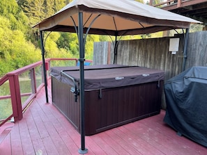 Hot tub deck with gas BBQ and a birds eye view of the Russian River.