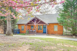 Property Exterior | 2-Story Cabin | Front Porch w/ Seating