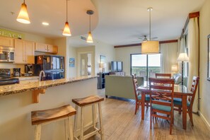 Barstool seating perfect for breakfast + brunch! Tons of natural light in this room as well!