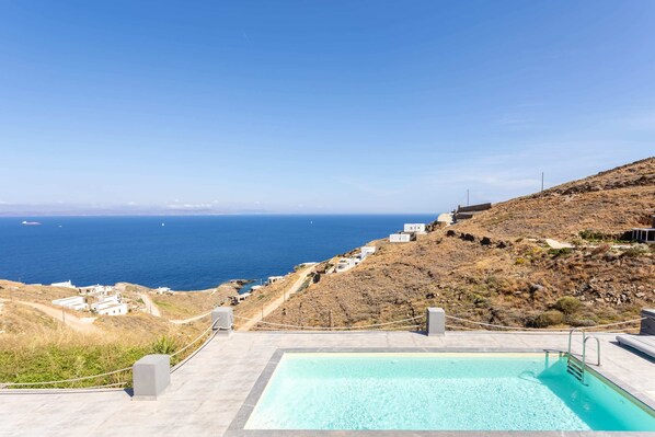 Lounging by the pool with a view to match.