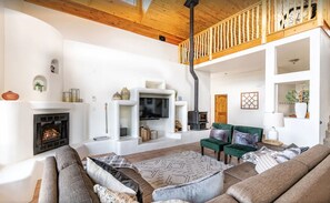 Main floor view of living area and loft. 