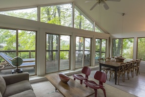 Dining room and back porch looking out to the water