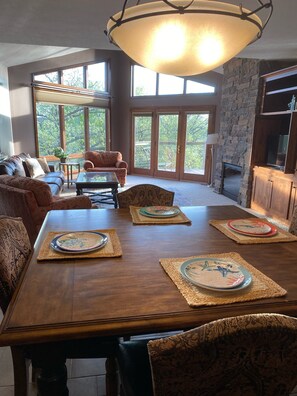 Dining room table, open concept for dinner or a family card game. 