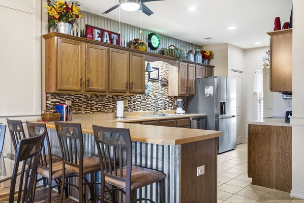 Full Kitchen with Extra Bar Seating