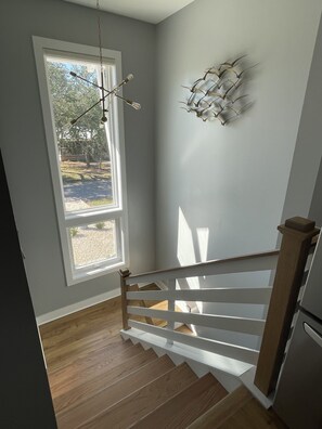 Staircase and Front Window with automatic Electric Window Shades