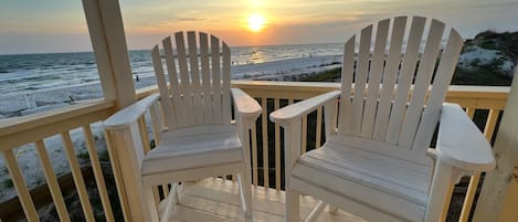 Pull up a chair and enjoy the view as the sun settles into the gulf.