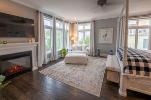 Bedroom 6 - 2nd Floor Master with king bed, electric fireplace, large walk-in closet.