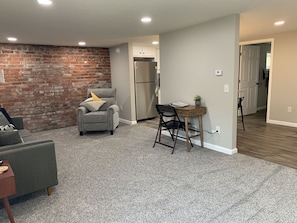 From living room looking towards kitchen and entry way.