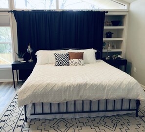 Main bedroom with king size bed and smart tv