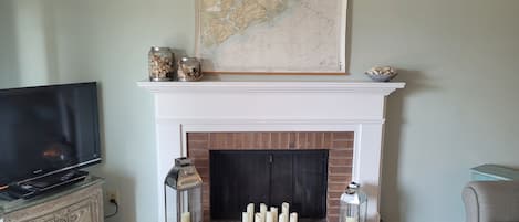 fireplace with authentic nautical chart