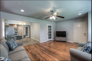 Spacious living room and kitchen area for you to relax during your stay