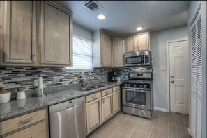 This kitchen is ready to accommodate all of your needs during upcoming stay