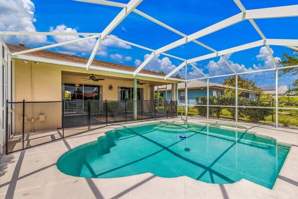 Enjoy The Coolness Of The Pool On A Hot Summer Day