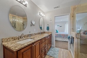 Master Bath with 2 sinks, and walk in shower with 2 shower heads.