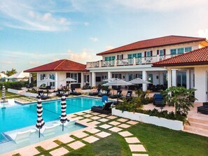 Relax in the sun or in the shade on the outdoor designer wicker furniture. 18 comfortable chaise lounges, 6 sun umbrellas, wingback chairs and tables.