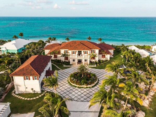 Located on the prestigious Banks Rd., the prime location on Eleuthera, Snaresbrook Manor sits directly on a mile-long pink sand beach.  This stunning property has 2.2 private acres and a 40 x 25 foot heated beachfront pool.