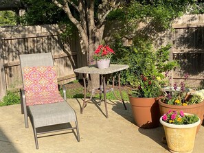 Chairs for lounging and sunning with plants for extra color and relaxation