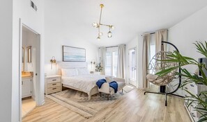 *SEA DREAMS BEACHFRONT SGI*  Master bedroom w/ KING bed; a serene and inviting space that is a perfect place to unwind and relax.
