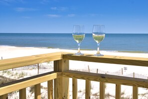 Imagine yourself relaxing on this private balcony while you listen to the sound of the crashing waves ~ only few steps away from the sugary white sandy beach! 