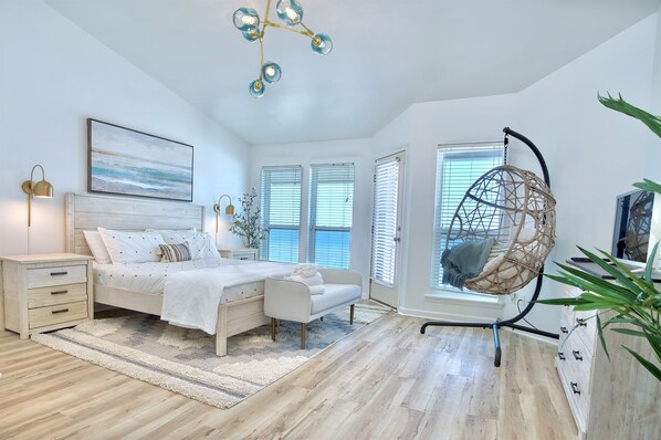 Dreamy master bedroom with unobstructed views of the Gulf