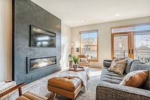 Electric lineal fireplace with 60" Samsung Smart TV