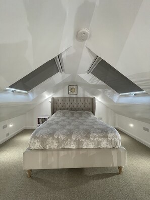 Bedroom from top of stairs