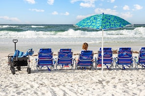 A 3 minute walk to the beach with the wagon makes this location ideal...away from the crowds, no elevators, no parking hassles! Simply enjoy the beach with all the gear - toys, umbrellas, wagon, cooler, all the chairs!