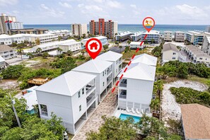 See the red line? Shortcut to Beach - go to the back left of the property, follow the sand trail, walking south towards the water, cross the street, then under the condos. BEACH!