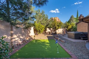 Red Rocks in the background while you practice your mini putt!