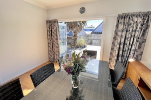 Dining room opening onto deck area