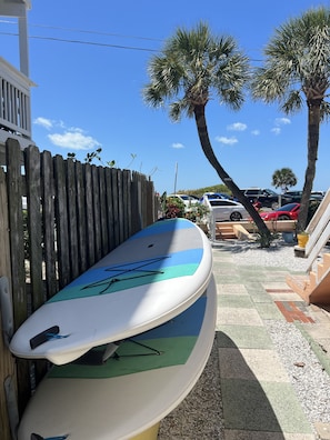 2 Paddle-boards! Walk down the steps from the unit they're directly to your left