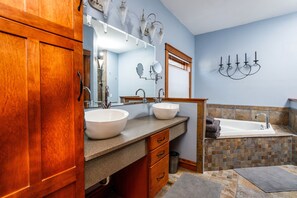 Full bathroom w:2 sinks, walk-in shower and soaking tub