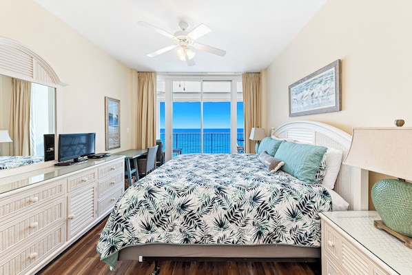 Primary suite with king bed and beach views