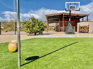 A quick game of tetherball brings together players of all ages in an exciting and competitive match.