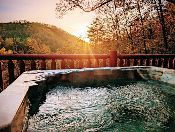 Relax in the hot tub while enjoying the gorgeous views