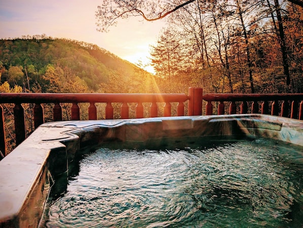 Relax in the hot tub while enjoying the gorgeous views