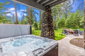 Soaking Hot Tub Nestled Beneath Timber Pergola + Lounge Area