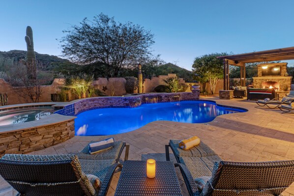 Introducing DESERT BLISS, our upscale E Mesa home with a magnificent backyard oasis.