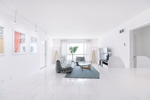 Relax and recharge in our spacious living room filled with natural light. 